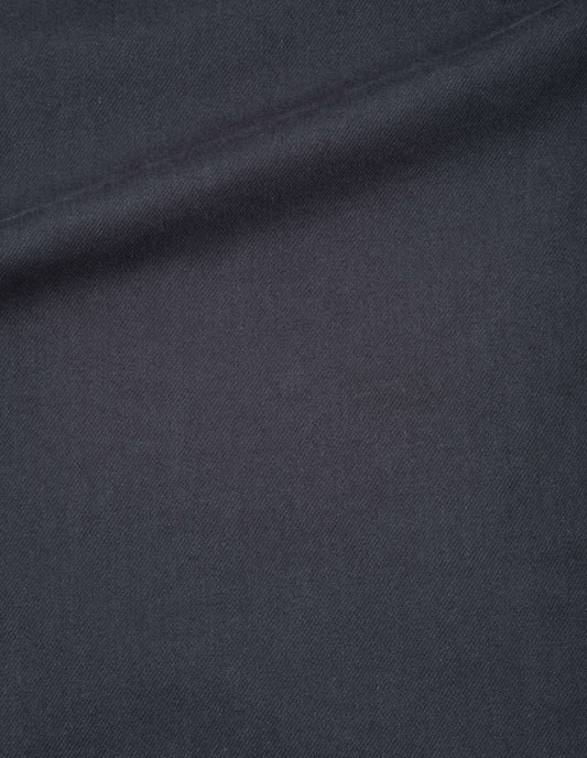 Dark navy trousers, worn cotton drill fabric swatch. 