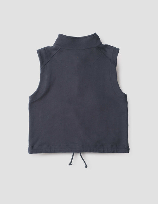 Dark blue high neck sleeveless track top with drawcord hem, back flat lay view.