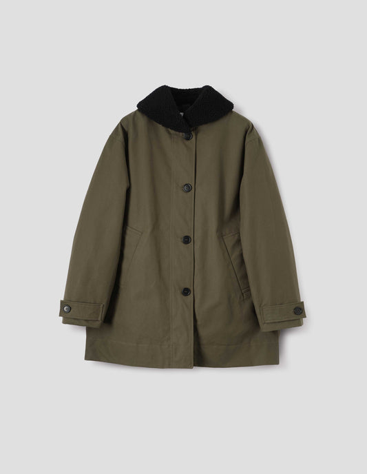 Khaki green coat with black fleece collar, slanted welt pockets with reinforced stitch detailing, corozo brace button fastening and button tab cuff adjusters. Front flat lay view.