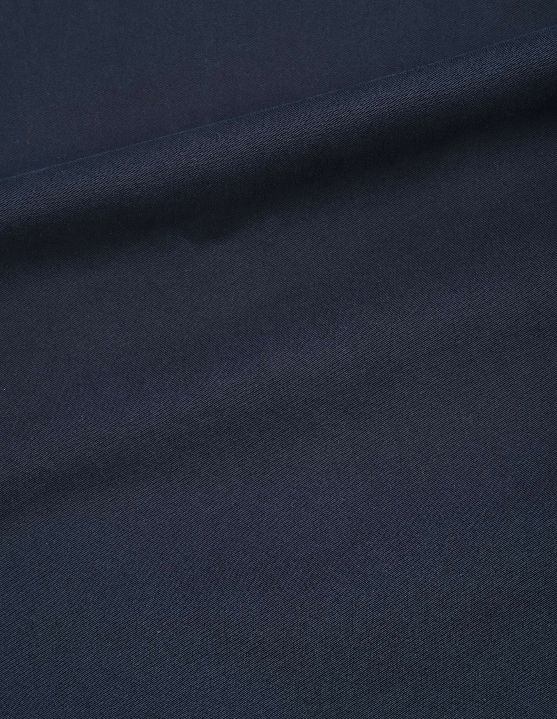 Dark blue soft dense cotton dress, fabric swatch.