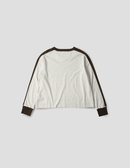 White long sleeve t-shirt with contrasting brown green stripe on cuffs, arms and neckline. Back flat lay view.