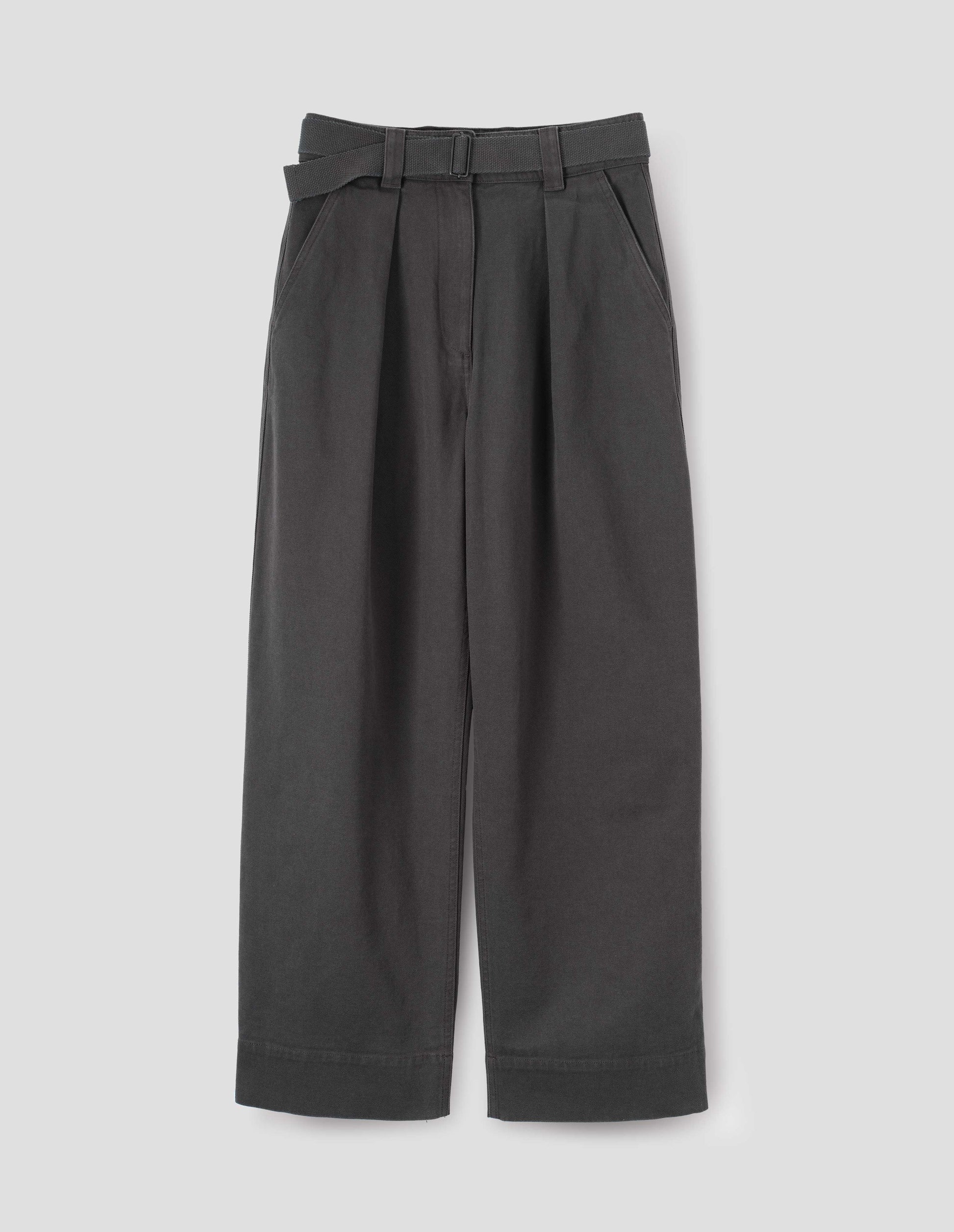 Charcoal grey wide leg trousers with button fastening waistband, slant pockets and removable webbing belt with metal slide adjuster. Front flat lay view.
