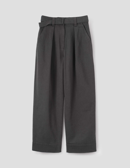 Charcoal grey wide leg trousers with button fastening waistband, slant pockets and removable webbing belt with metal slide adjuster. Front flat lay view.