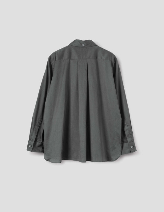 Grey long sleeve shirt with elongated back and removeable self fabric tie. Back flat lay view.