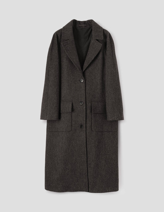Brown wool longline overcoat with raglan sleeve, button fastening lapel and deep flap patch pockets. Front flat lay view.