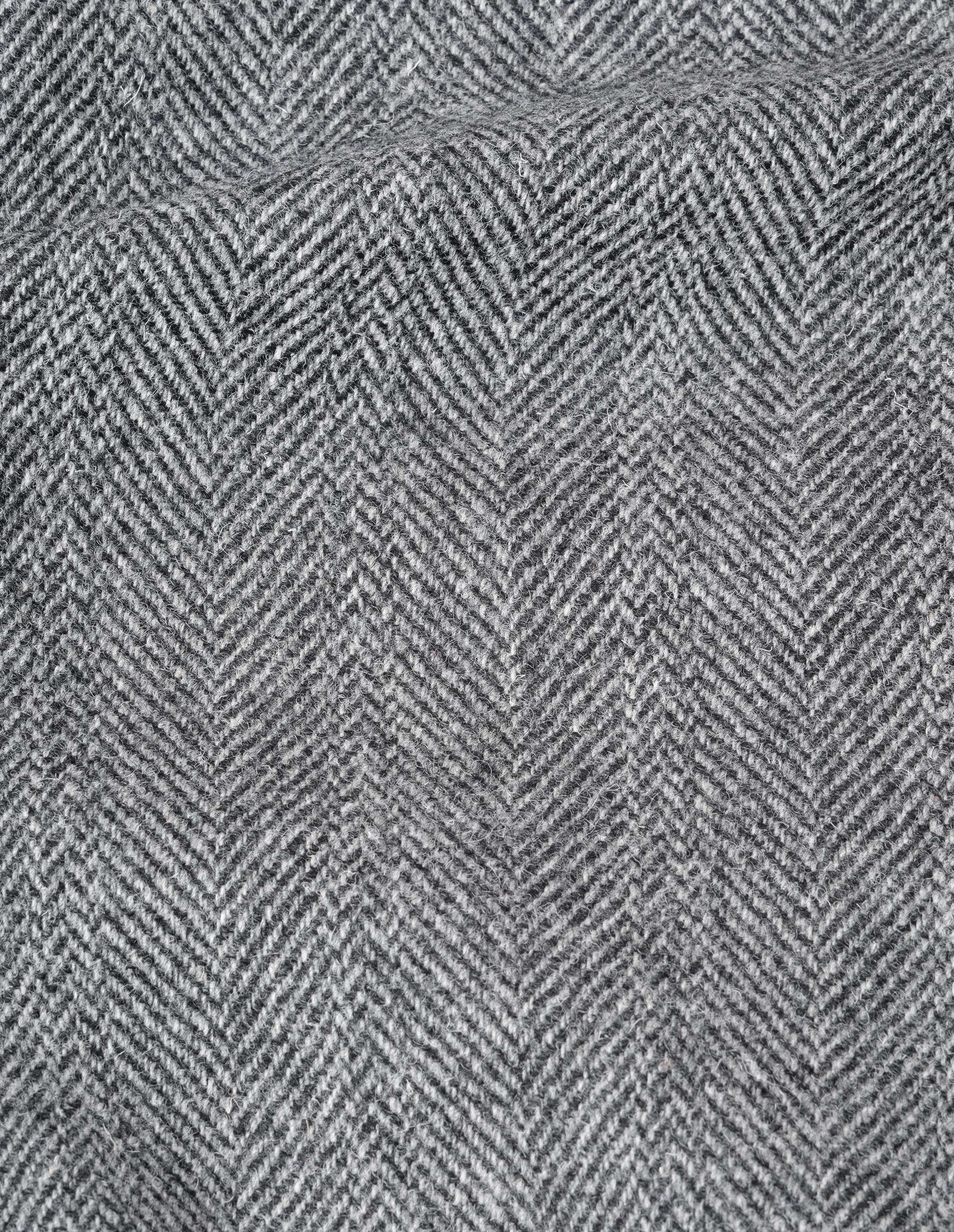 Grey and black wide herringbone wool blazer fabric swatch. 