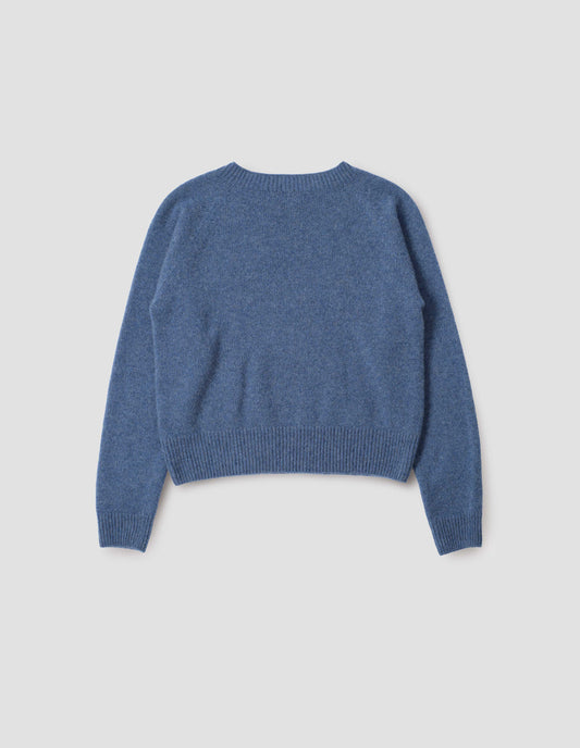 Blue long sleeve cashmere jumper, with raglan sleeve and contrasting rib on neck, cuffs and hem. Back flat lay view.