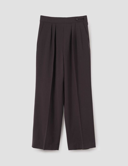 Brown double pleated wool trousers, with concealed side zip, pull through tab side fastening and slant pockets. Front flay lay view.