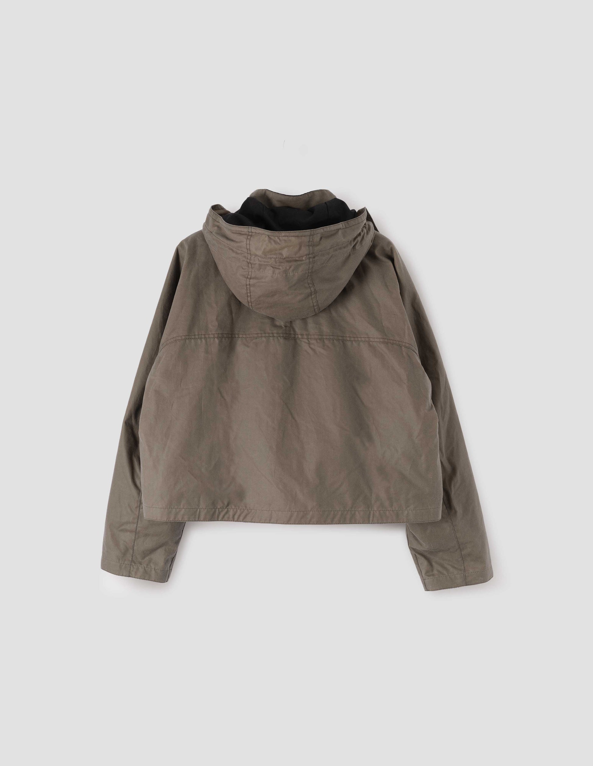 Dark beige boxy jacket with stand collar, hood and raglan sleeve. Back flat lay view.