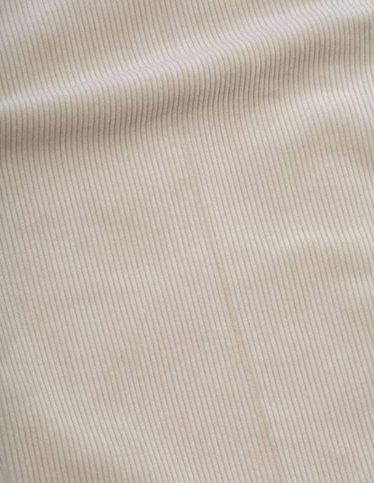 Beige corduroy trousers, fabric swatch.
