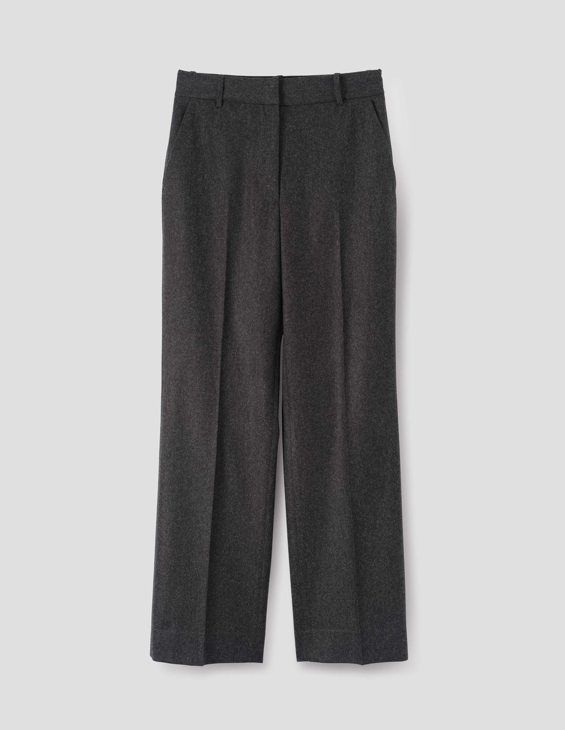 Charcoal grey wool trousers with slant side pockets, belt loops and concealed zip fastening. Front flat lay view.