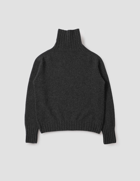 Charcoal grey high neck cashmere jumper, with saddle sleeve and contrasting wide rib on neck, cuffs and hem. Back flat lay view.