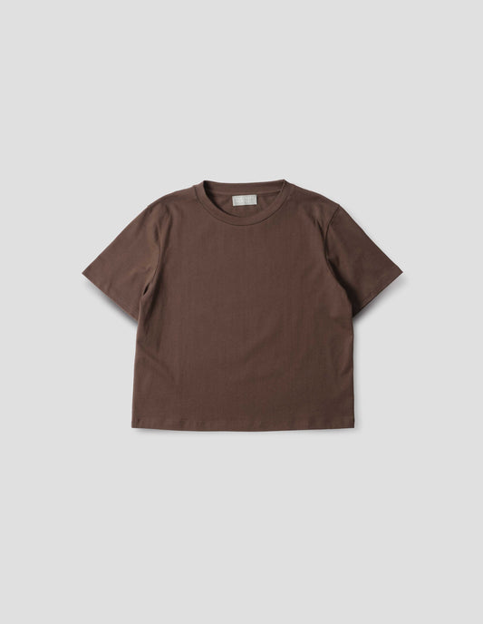 Dark brown jersey t-shirt with crew neck. Front flat lay view.