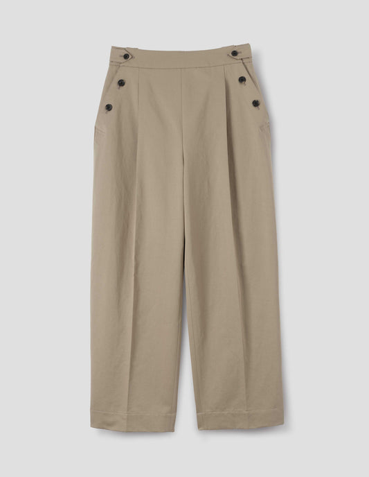 Beige cotton linen pleated trousers with horn button side cinches and three horn button closures on both sides, and with stitch-through hem. Front flat lay view.