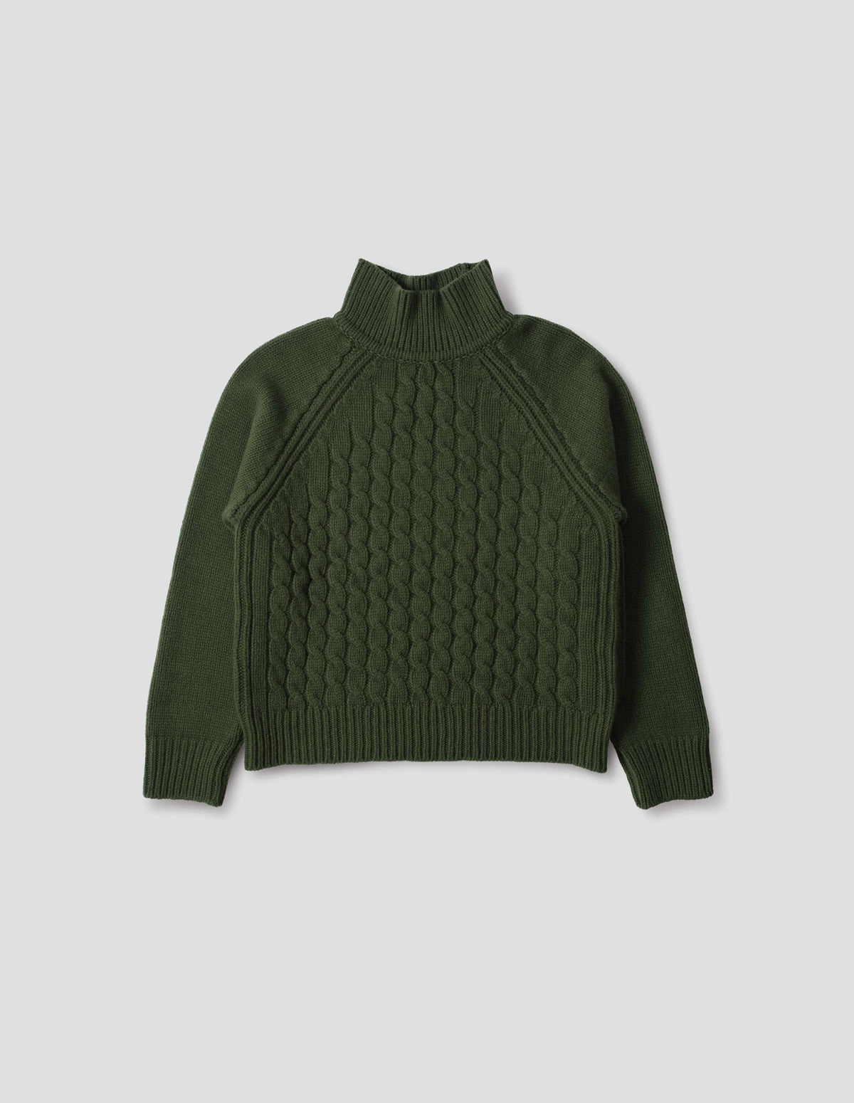 Green merino jumper with ribbed high neck collar, front cable design, raglan sleeves with ribbed side seams, cuffs and hem. Front flat lay view.