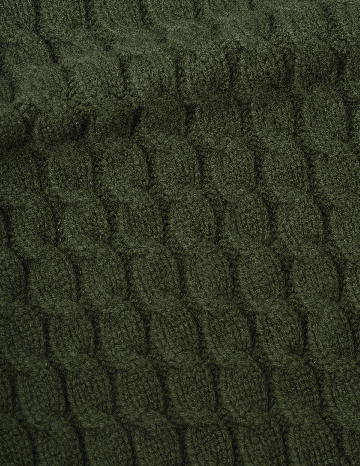 Green soft spun wool slipover, fabric swatch.