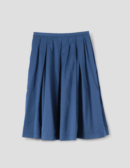 Blue cotton silk skirt with narrow waistband, concealed side zip with hook and bar fastening, box pleats with darts and concealed side seam pockets. Back flat lay view.