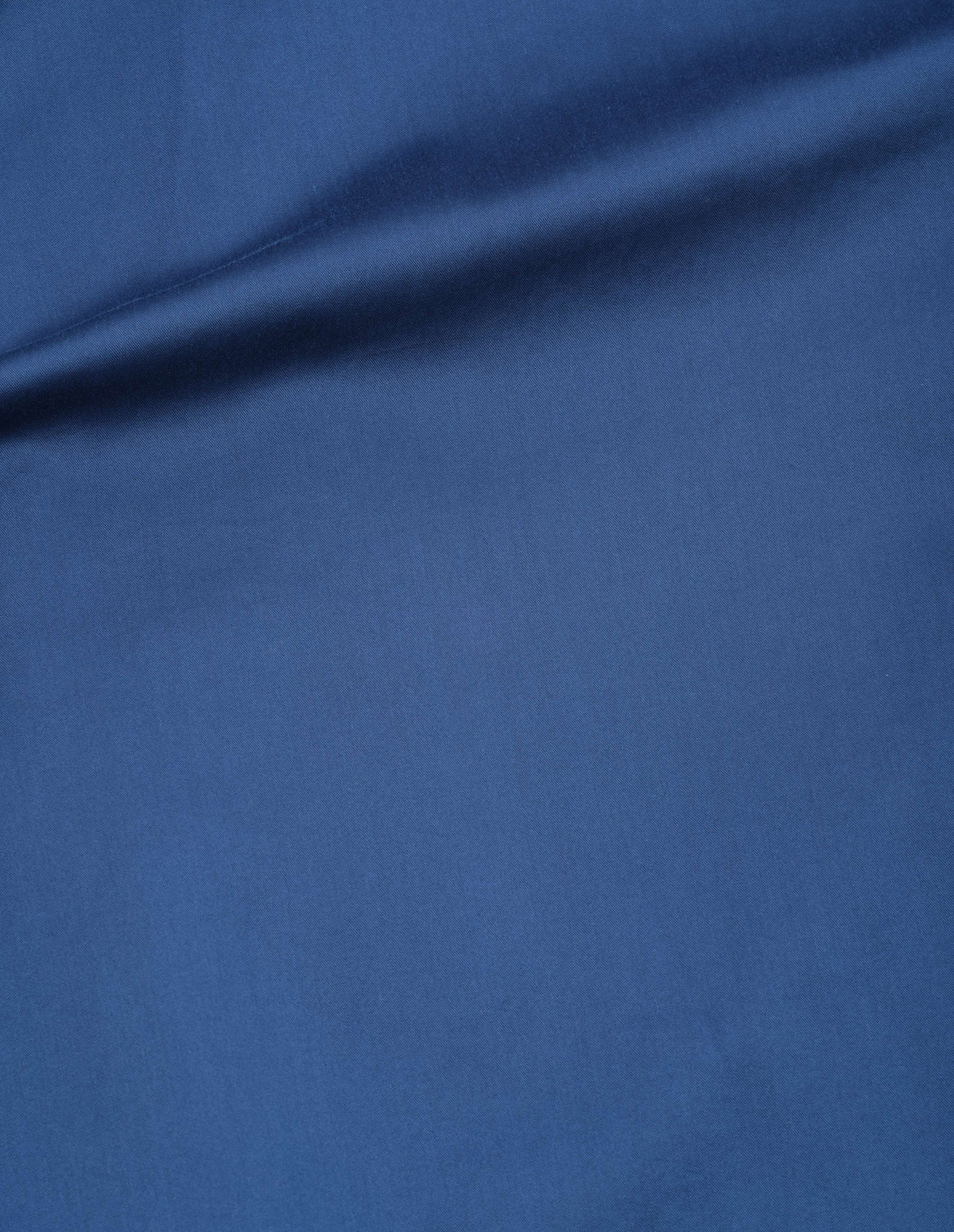 Blue cotton silk poplin skirt fabric swatch.