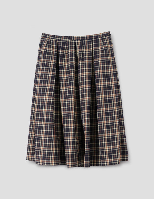 Dark blue wool linen  skirt with beige and brown checks, narrow waistband, concealed side zip with hook and bar fastening, box pleats with darts and concealed side seam pockets. Front flat lay view.