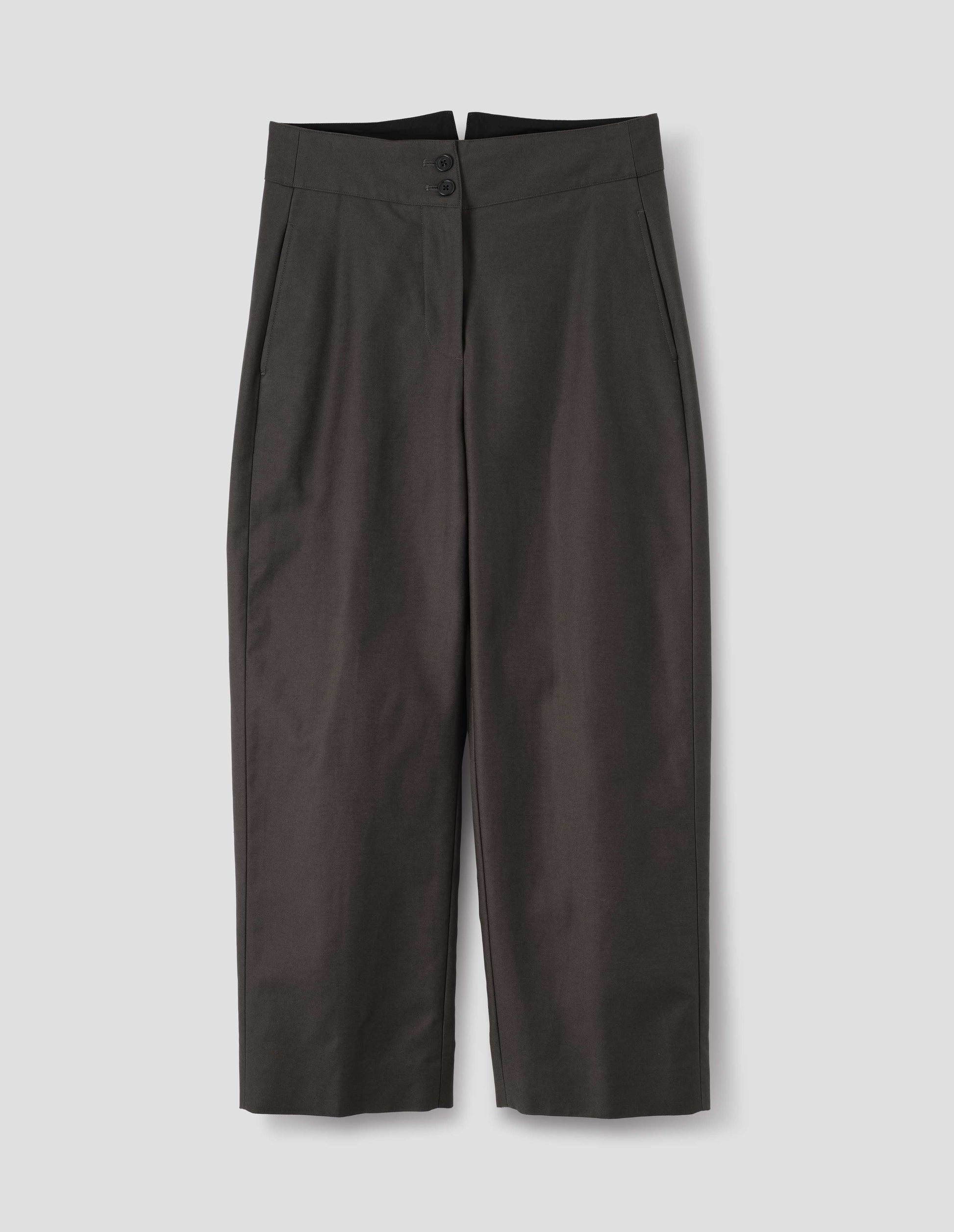 Grey cotton trousers with double horn button fastening and concealed side pockets with stitch detailing. Front flat lay view