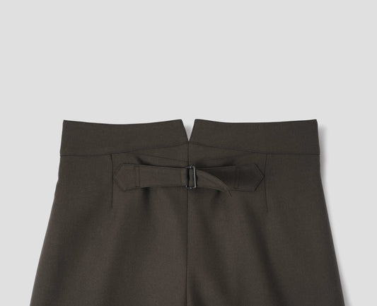 Brown wool trousers with back cinch. Back flat lay view.