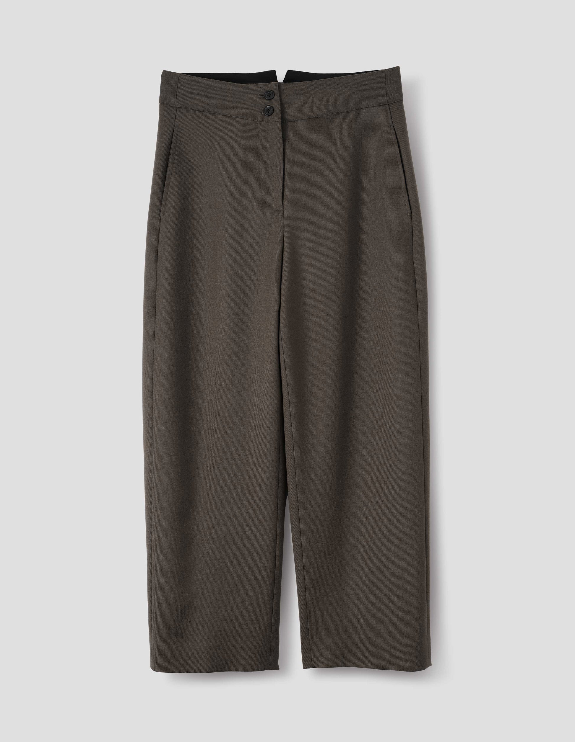 Brown wool trousers with double horn button fastening and concealed side pockets with stitch detailing. Front flat lay view