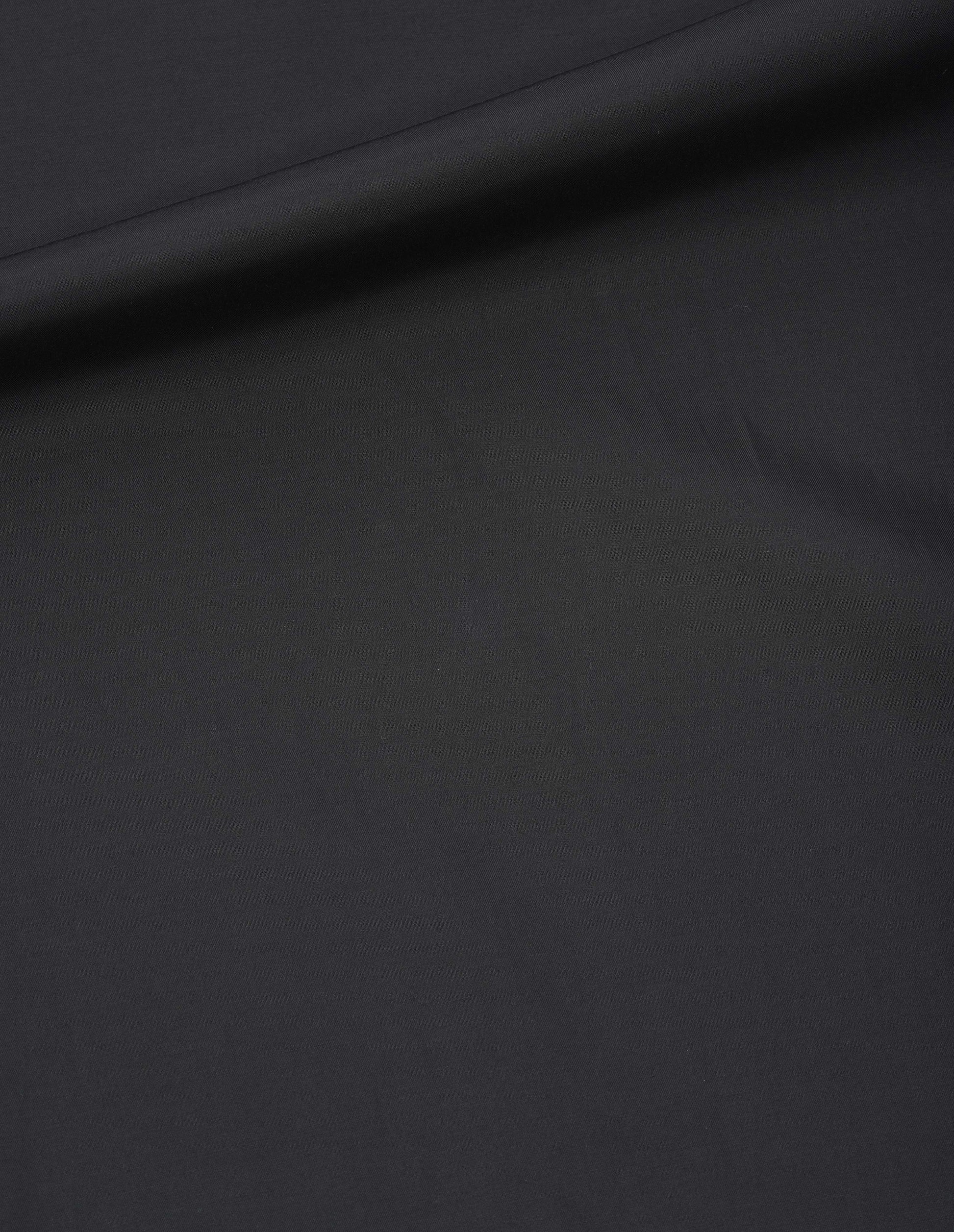 Black fluid cotton blend dress fabric swatch.
