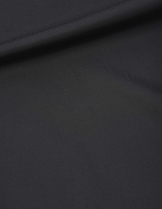 Black fluid cotton blend dress fabric swatch.