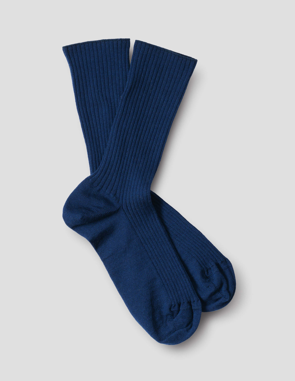 Blue wool socks, ribbed, front flat lay view.
