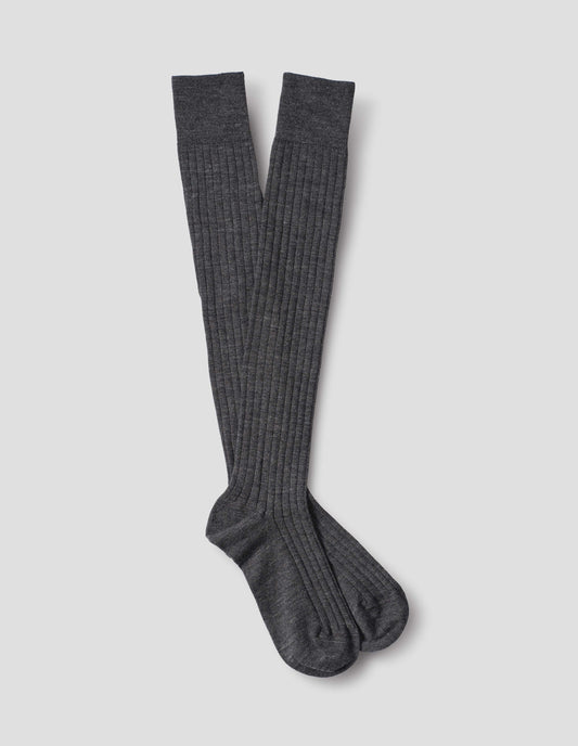 Dark grey wool socks, long and ribbed, front flat lay view.
