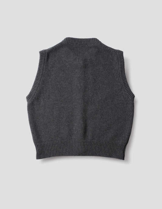 Dark grey cashmere merino knitted gilet with rib detailing at neck, armholes and hem. Back flat lay view.