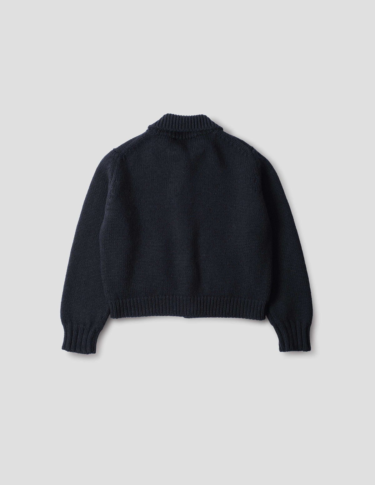 Dark navy blue boxy fit collared cardigan, with rib detailing on collar, hem and cuffs, back flat lay view.