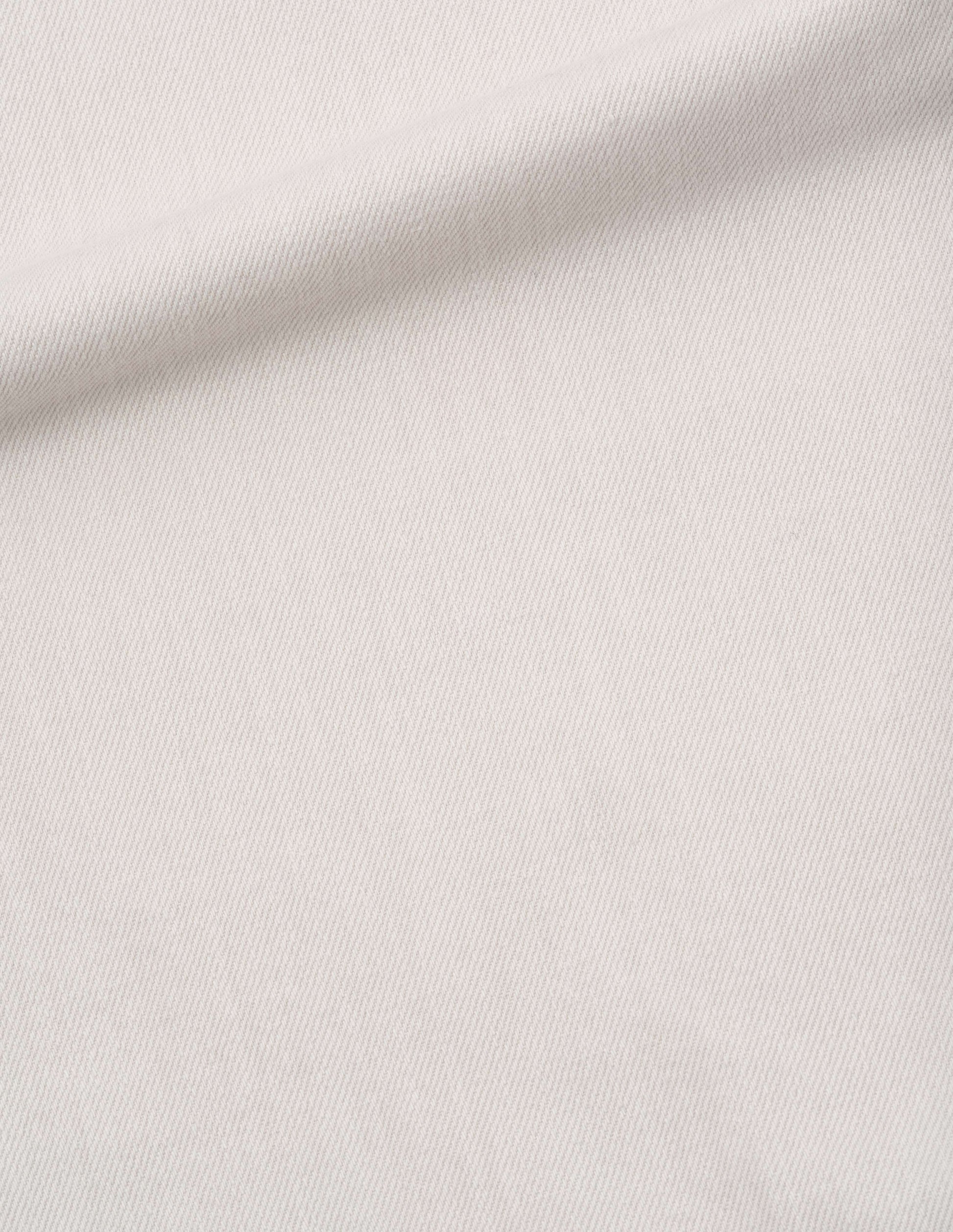 Off white faded cotton drill trouser, fabric swatch.