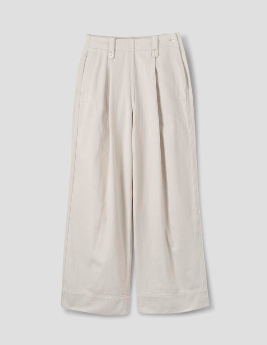 Off white trousers with with grown-on waistband, button-fastening belt loops, a side opening with integrated side seam pockets, and two front pleats. Front flat lay view.