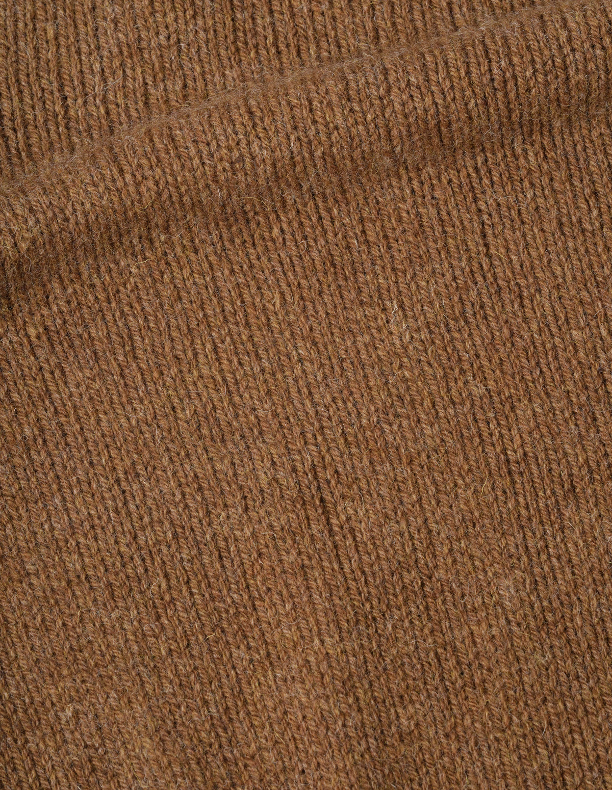 Orangey brown wool crew neck jumper, fabric swatch.