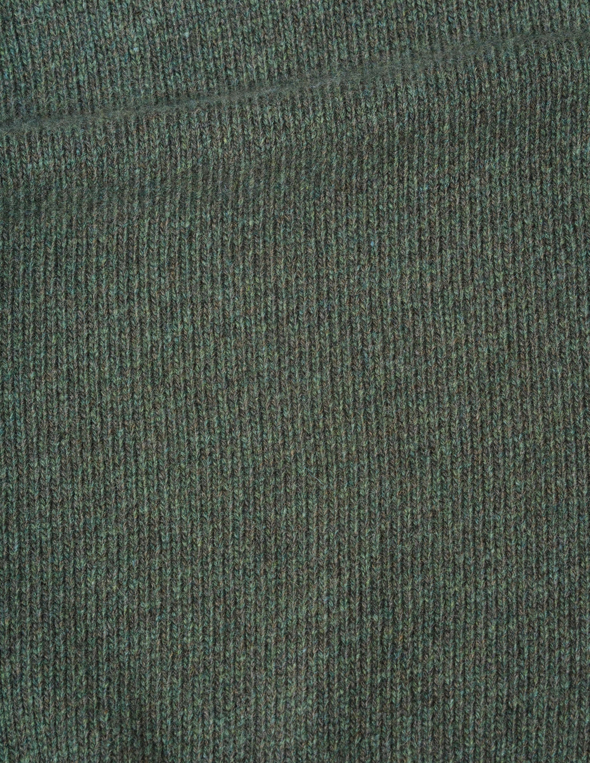 Green knitted lambswool raglan jumper, fabric swatch.