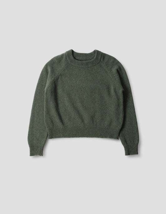 Green knitted wool jumper with crew neck, raglan sleeves, and rib detailing on the neck, cuffs and hem. Front flat lay view.