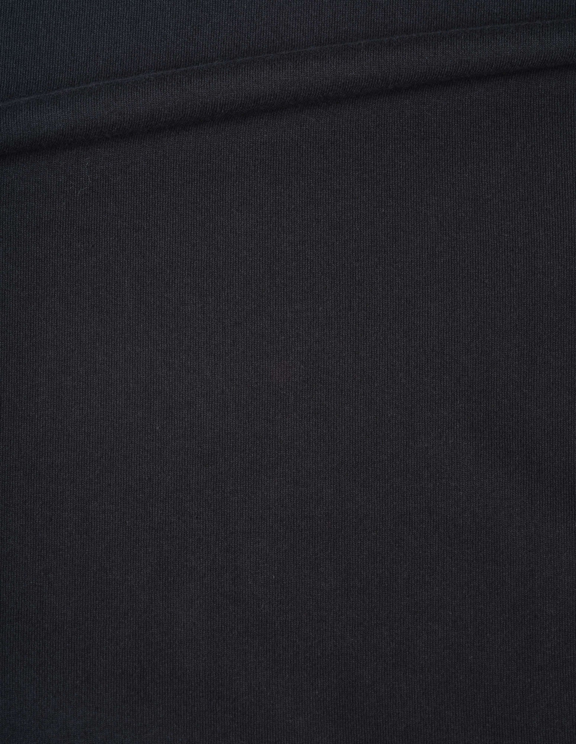 Black short sleeve T shirt with a wide neck, deep faced cuffs in with a contrast brown colour on the reverse, fabric swatch.