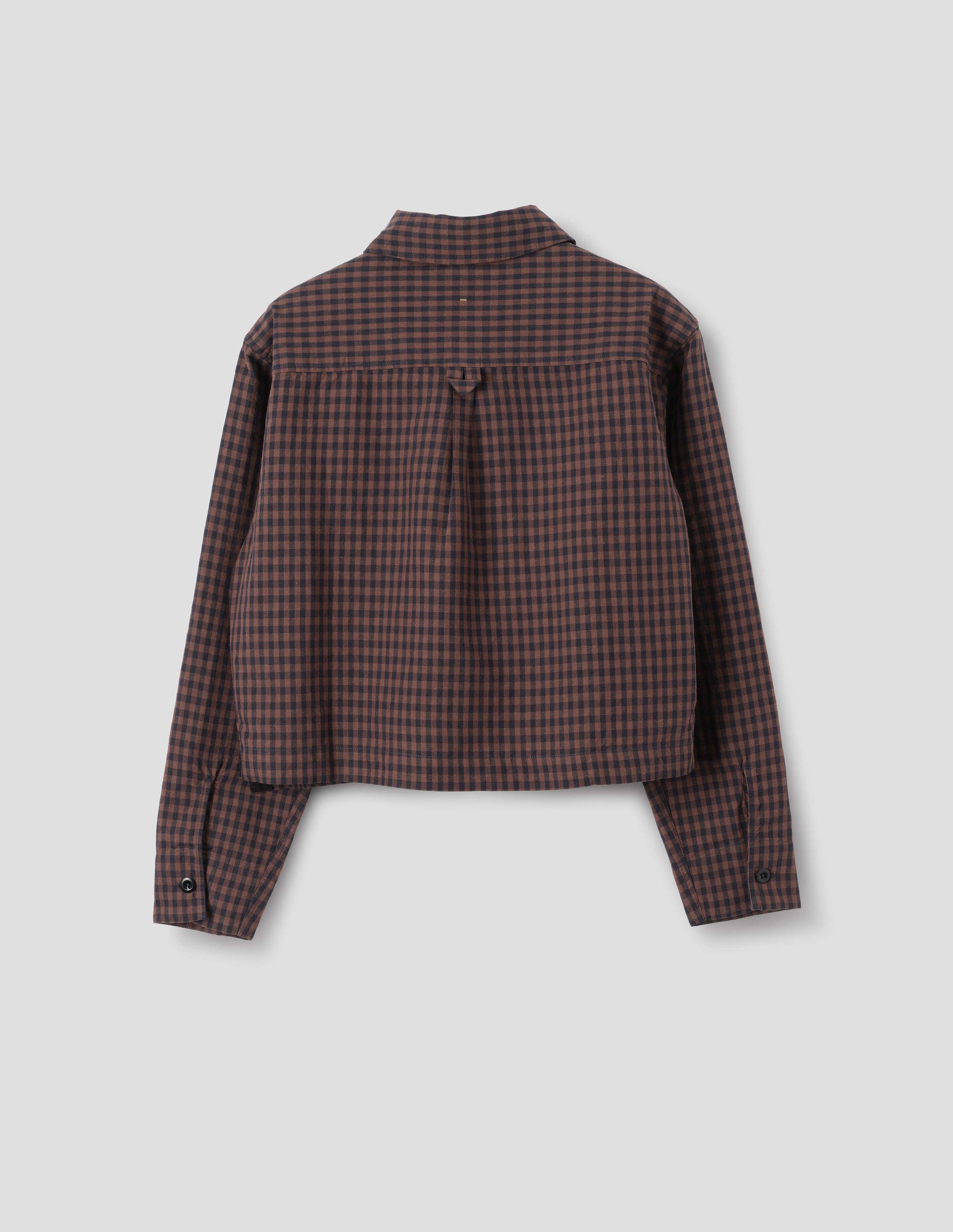 Brown and dark blue check cotton linen shirt, with back yoke, box pleat, external hem loop detailing and button cuffs, back flat lay view.