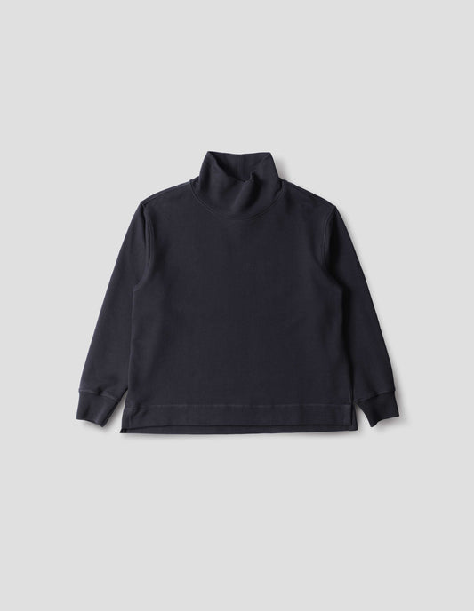 Dark navy loose funnel neck sweatshirt with single rib on cuffs and flatlock stitching on seams, stepped vent split hem, front flat lay view.
