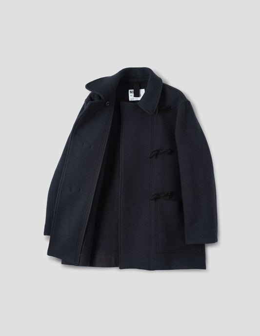 Dark blue coat with wide front wrap fastening with wooden toggles, patch pockets, unlined, open flat lay view.