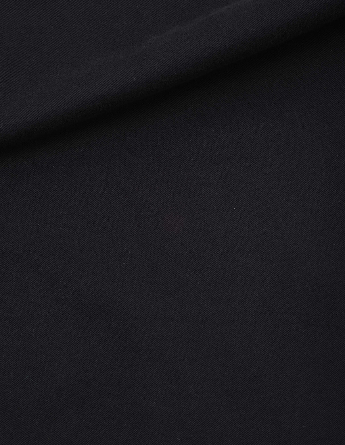 Black cotton twill sleeveless lightly padded liner, fabric swatch.