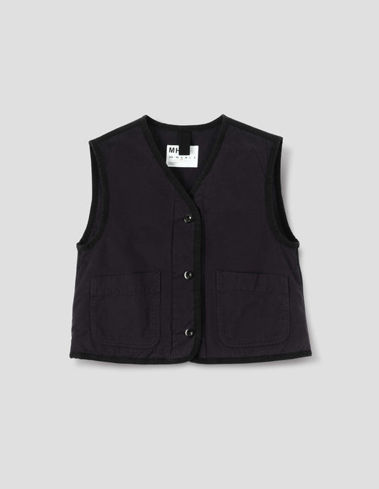 Black cotton twill sleeveless lightly padded liner with front patch pockets, and herringbone binding along edges and seam, front flat lay view.