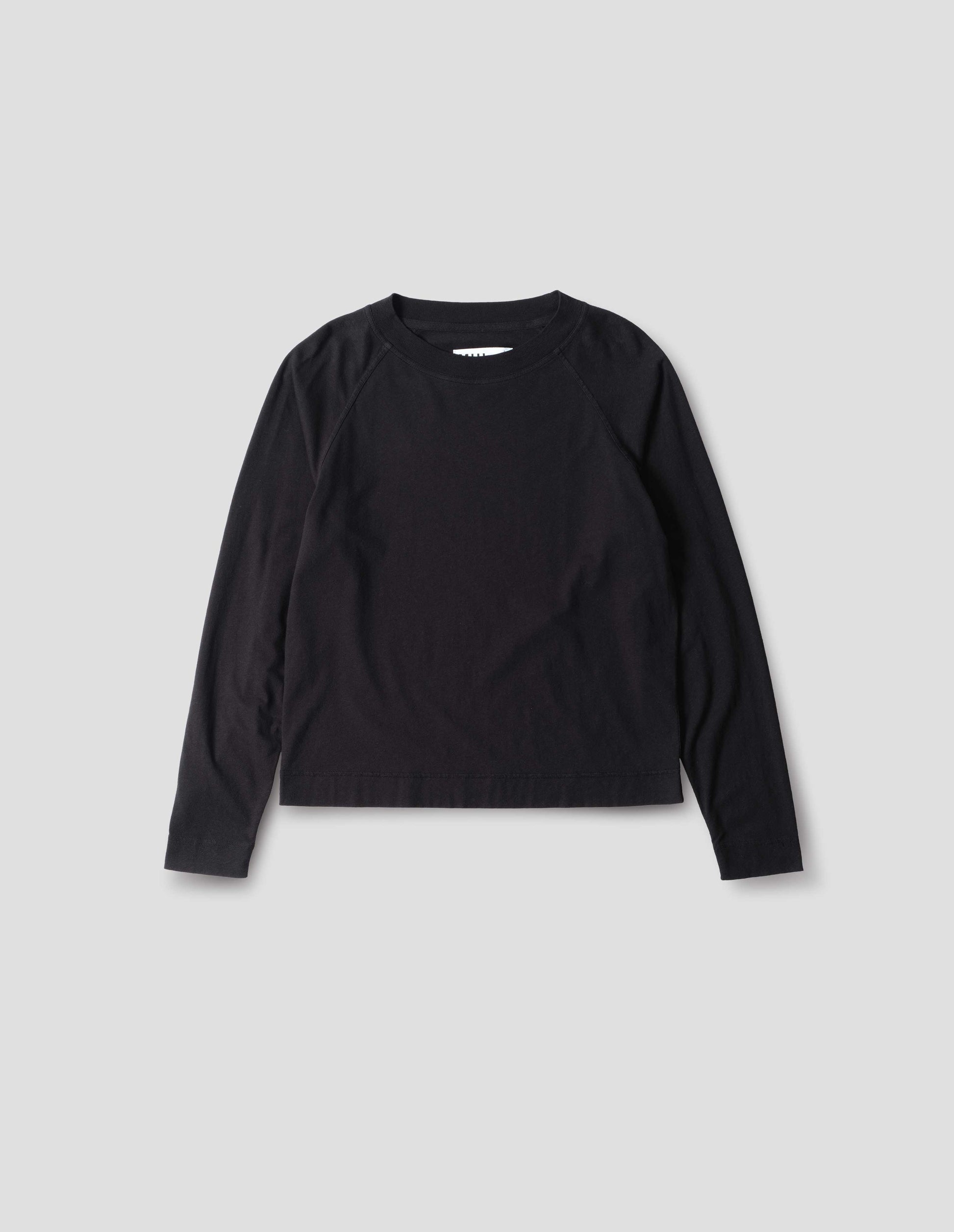 Black cotton linen raglan t shirt with a rib crew neck, front flat lay view.