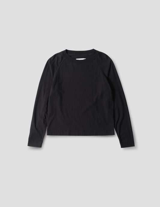 Black cotton linen raglan t shirt with a rib crew neck, front flat lay view.