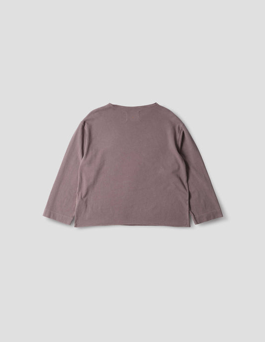 Purpleish pink cotton jersey top, with rolled raw edge neck and hem and wide cuffs, back flat lay view.