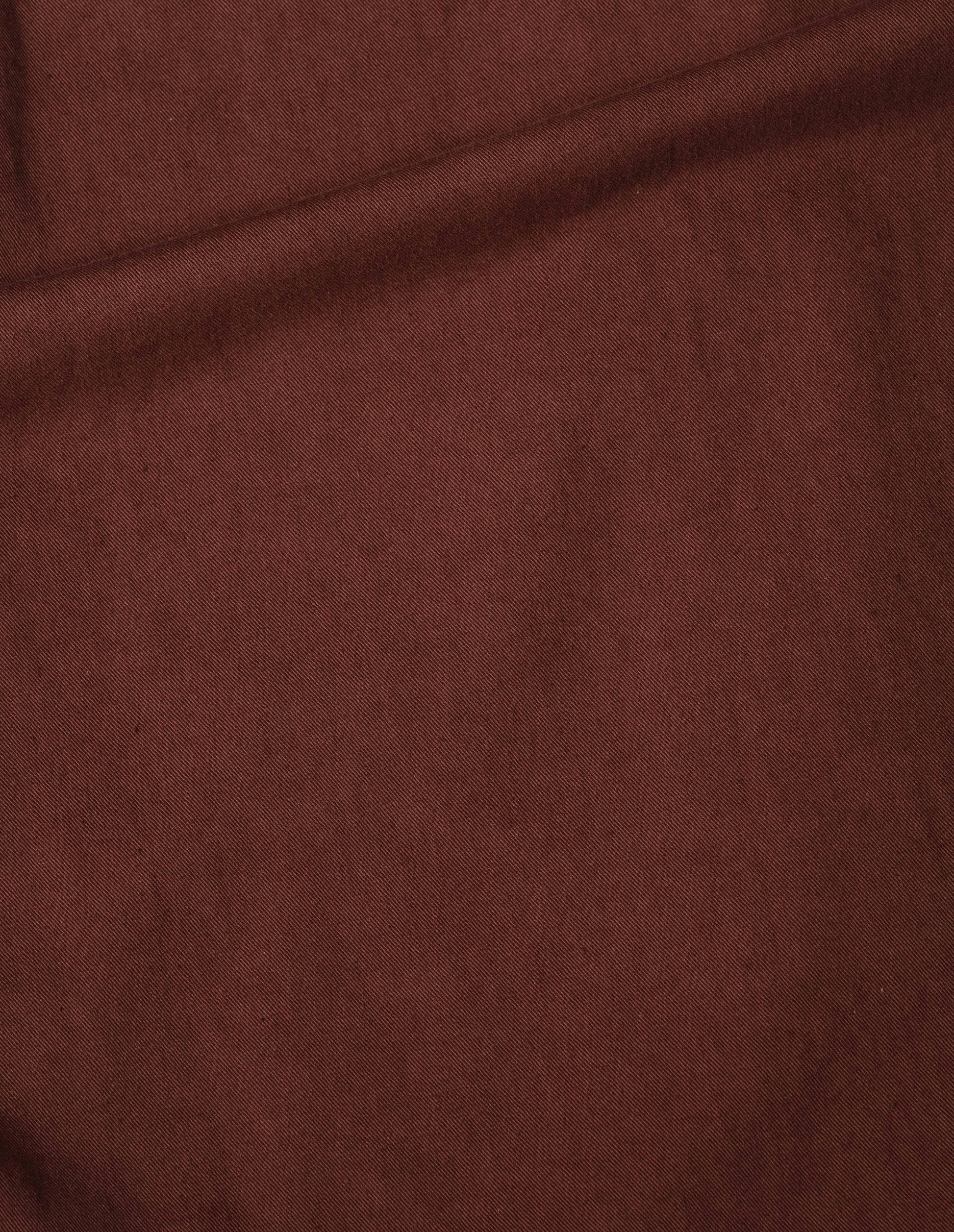 Reddish cotton shawl collar overshirt, fabric swatch.