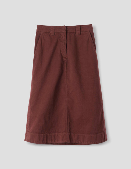 Red A line skirt with side splits, double hook and bar fastening waistband, belt loops and slant pockets. Front flat lay view.