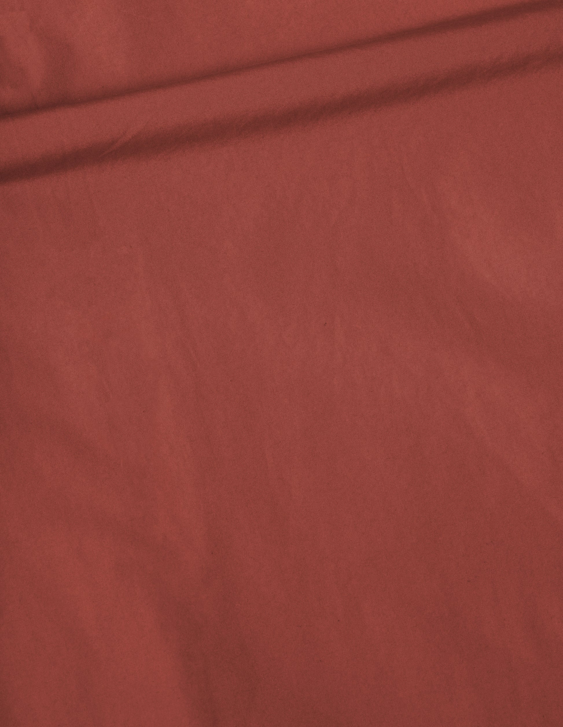 Red cotton poplin shirt, fabric swatch.