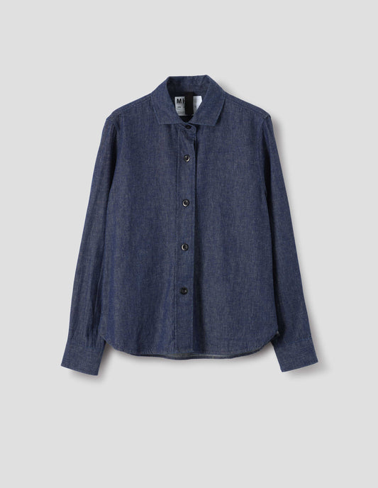 Blue cotton linen shirt, with rounded hem and dark buttons, front flat lay view.